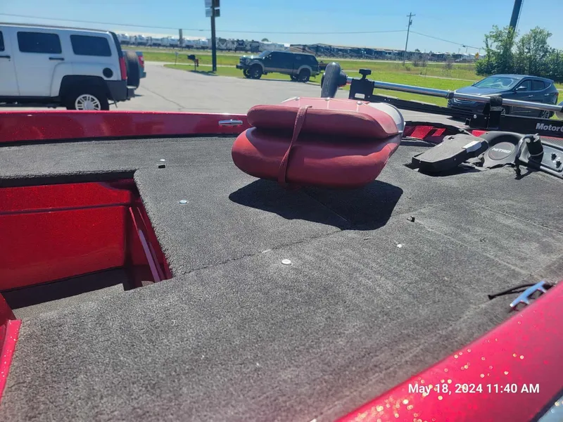 Slide: The Image of 2004 Nitro NX 750 SC boat interior with life jacket on deck. - 5