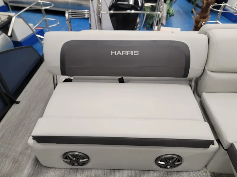 Slide: The Image of 2024 Harris Cruiser 230 boat seating with integrated speakers. - 15