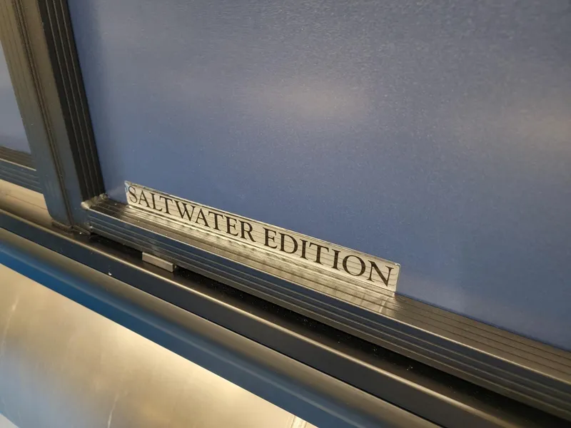 Slide: The Image of 2024 Harris Cruiser 230 Saltwater Edition nameplate. - 29