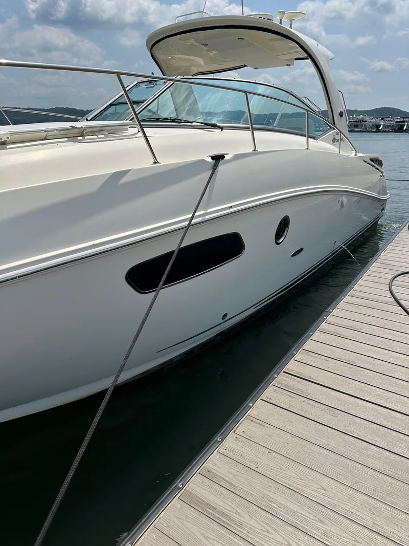 Slide: The Image of 2008 Sea Ray 350 Sundancer docked on a sunny day. - 2