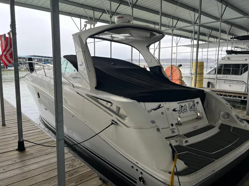 Slide: The Image of 2008 Sea Ray 350 Sundancer docked in a covered marina. - 8