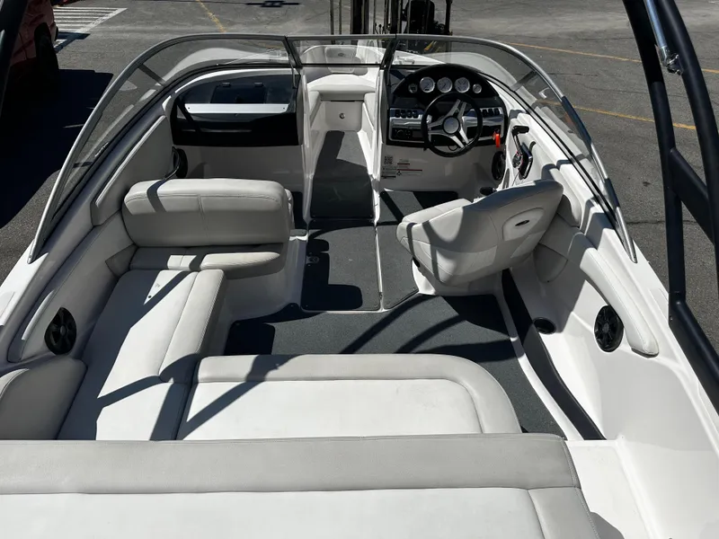 Slide: The Image of 2018 Regal 1900 ES Bowrider interior with seating and dashboard. - 10