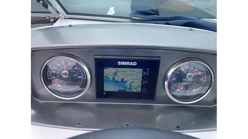 Slide: The Image of Dashboard of a 2022 Hurricane SD 187 boat with Simrad navigation system. - 10