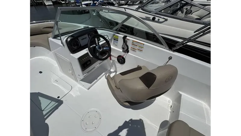 Slide: The Image of 2022 Hurricane SD 187 boat interior with steering console and seating. - 6