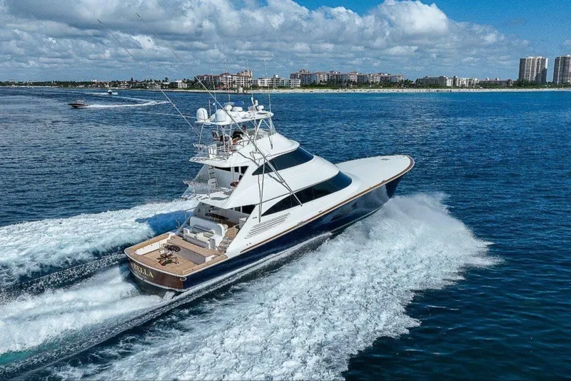 Slide: The Image of 2018 Viking 92 Sky Bridge yacht cruising on open water. - 1