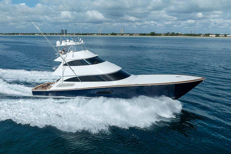 Slide: The Image of 2018 Viking 92 Sky Bridge yacht cruising on open water. - 3