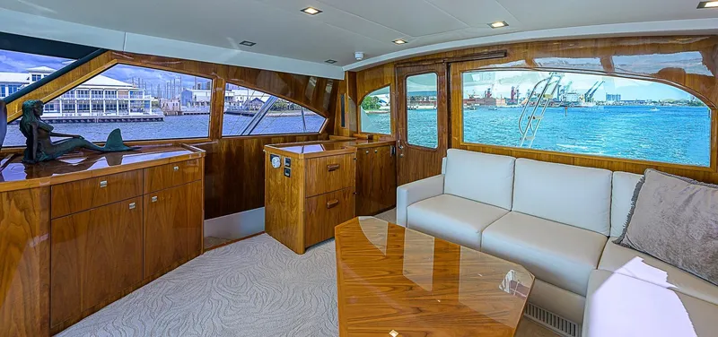 Slide: The Image of Luxurious interior of 2018 Viking 92 Sky Bridge yacht with waterfront view. - 46