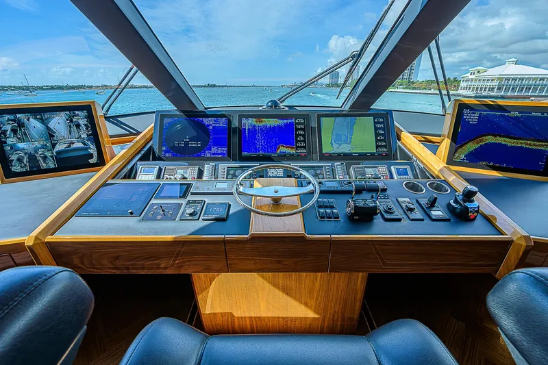 Slide: The Image of Cockpit of 2018 Viking 92 Sky Bridge yacht with advanced navigation systems. - 47