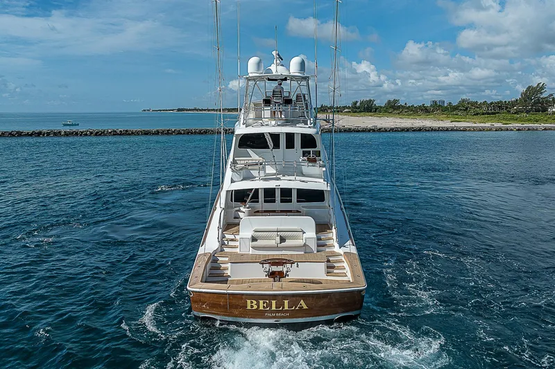 Slide: The Image of 2018 Viking 92 Sky Bridge yacht Bella cruising in open water. - 5