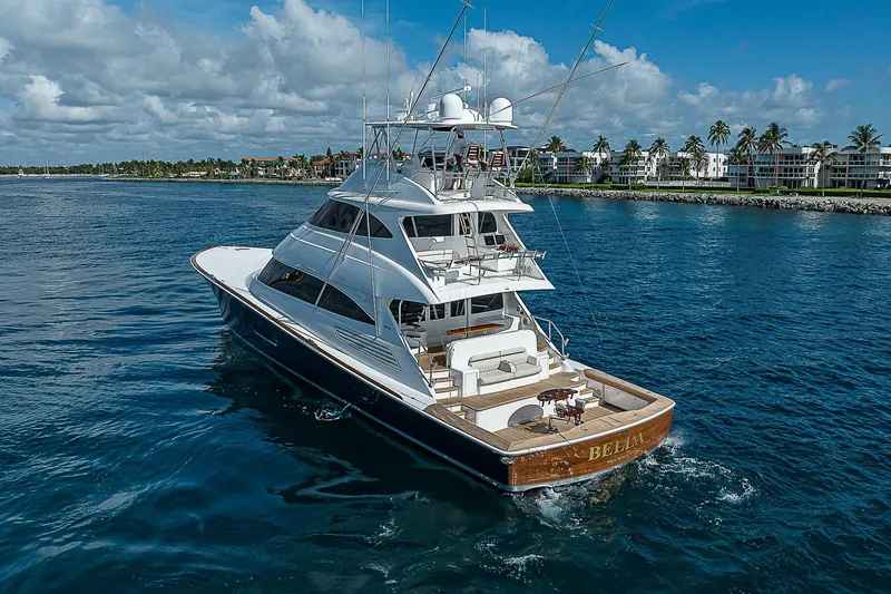 Slide: The Image of 2018 Viking 92 Sky Bridge yacht cruising on a sunny day. - 6
