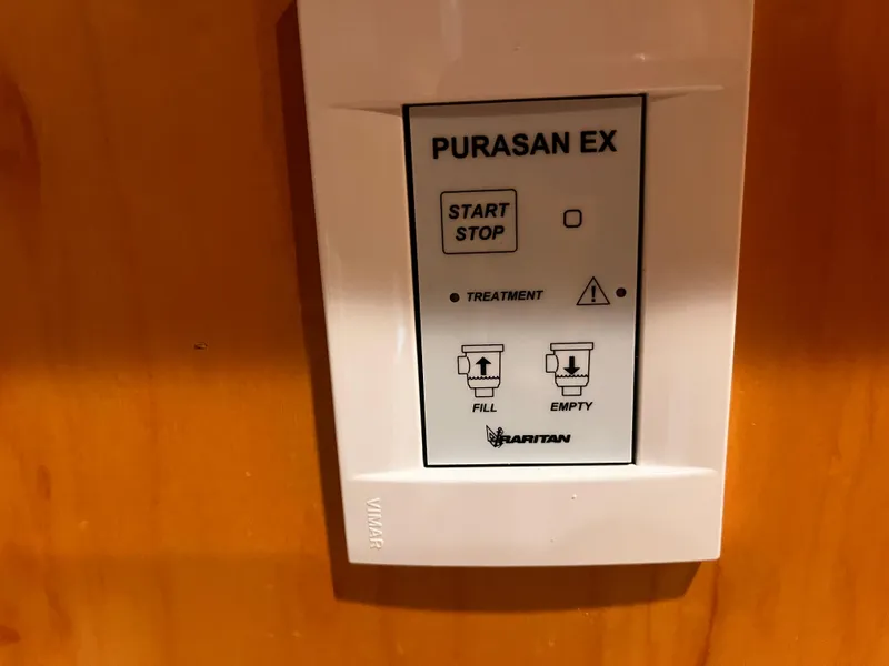Slide: The Image of Control panel of Purasan EX system in a 2004 Starlight 68X16 boat. - 22