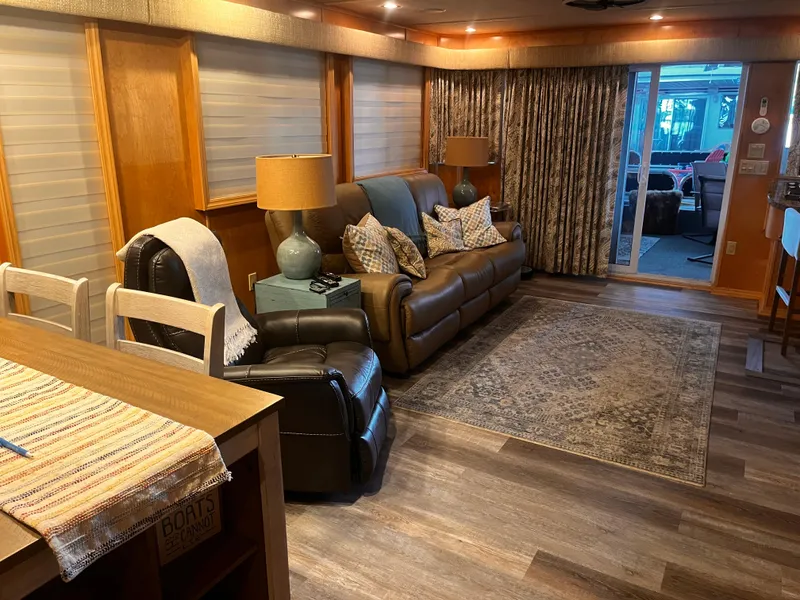 Slide: The Image of Cozy living room in a 2004 Starlight 68X16 mobile home with modern decor. - 8