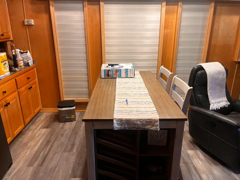 Slide: The Image of Modern kitchen interior of a 2004 Starlight 68X16 mobile home. - 9