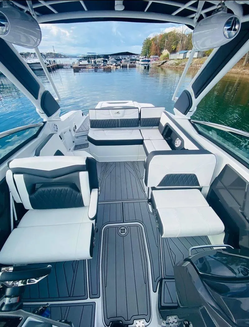 Slide: The Image of 2023 Monterey 298SS boat interior with luxurious seating and modern design. - 16