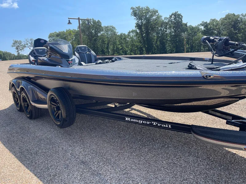Slide: The Image of 2024 Ranger Z521R Ranger Cup Equipped boat on trailer, parked outdoors. - 3