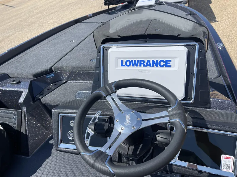 Slide: The Image of 2024 Ranger Z521R boat dashboard with Lowrance GPS and steering wheel. - 4