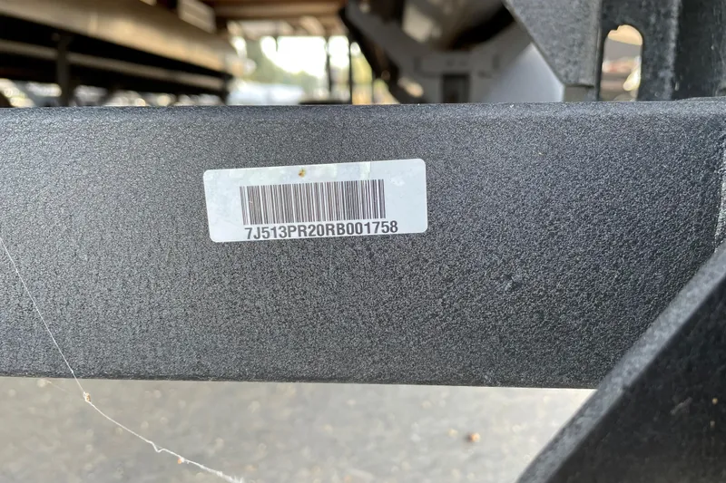 Slide: The Image of Barcode and serial number on 2024 Sun Tracker Fishin' Barge 22 DLX frame. - 84