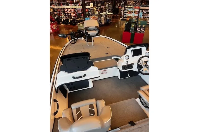Slide: The Image of 2024 Nitro Z18 Pro boat interior with seating and control panel in a showroom. - 60