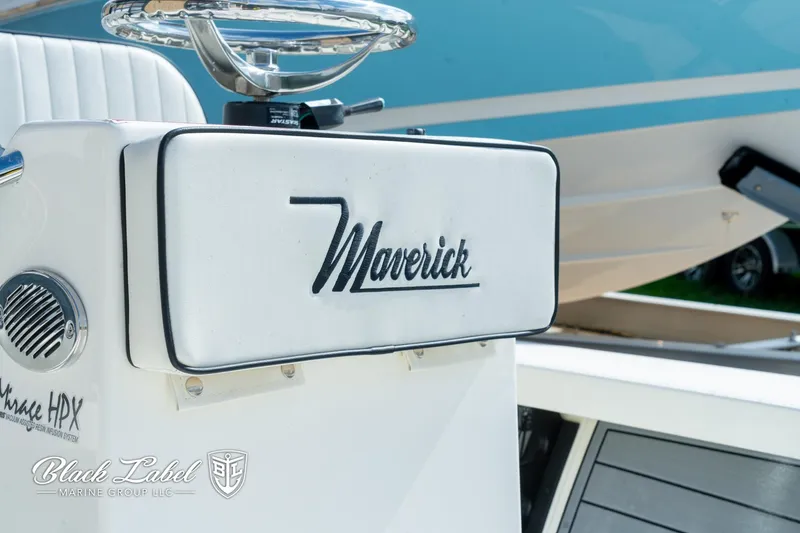 Slide: The Image of 2024 Maverick HPX-S 17 boat console with logo and steering wheel. - 11