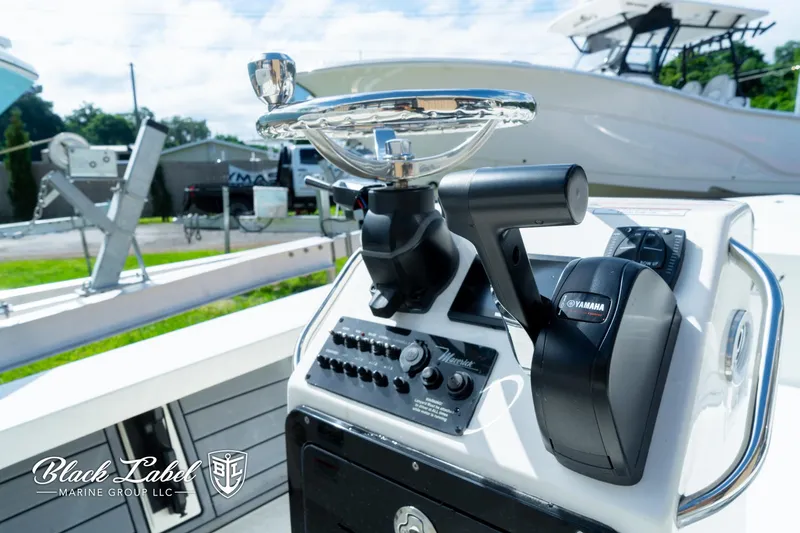 Slide: The Image of 2024 Maverick HPX-S 17 boat control panel with Yamaha throttle, Black Label Marine Group. - 14