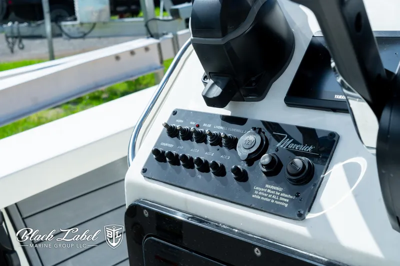 Slide: The Image of Control panel of a 2024 Maverick HPX-S 17 boat by Black Label Marine Group. - 15