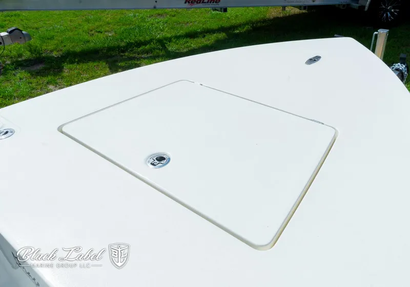 Slide: The Image of 2024 Maverick HPX-S 17 boat deck with storage hatch. - 23