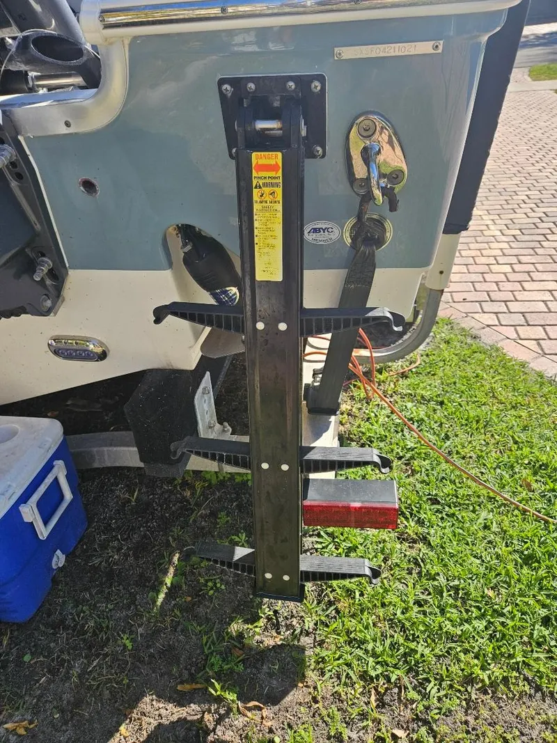 Slide: The Image of 2021 Sea Hunt Gamefish 25 boat with trailer hitch and accessories. - 23