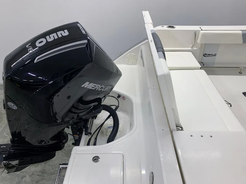 Slide: The Image of 2024 Robalo R232 Explorer boat with Mercury outboard engine. - 11