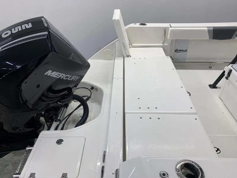 Slide: The Image of 2024 Robalo R232 Explorer boat with Mercury outboard engine. - 14