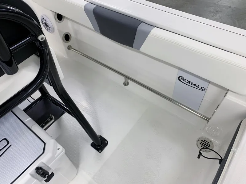 Slide: The Image of 2024 Robalo R232 Explorer boat interior, featuring sleek seating and modern design elements. - 18