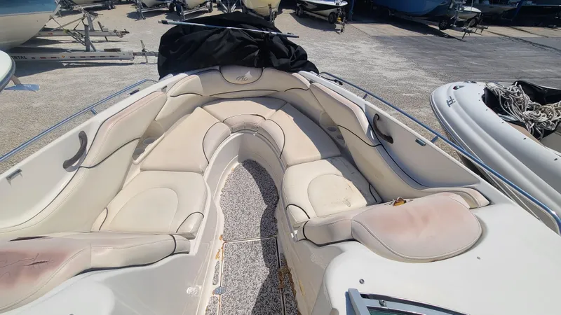 Slide: The Image of 2004 Monterey 268 SS Open Bow Sport boat with spacious seating area. - 10