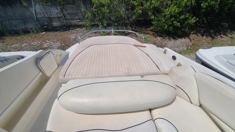 Slide: The Image of 2004 Monterey 268 SS Open Bow Sport boat with spacious seating and sun pad. - 19