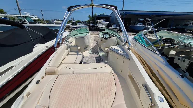 Slide: The Image of 2004 Monterey 268 SS Open Bow Sport boat with spacious seating and sleek design. - 28