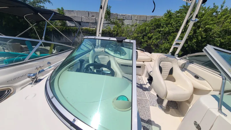 Slide: The Image of 2004 Monterey 268 SS Open Bow Sport boat with white interior and seating. - 8