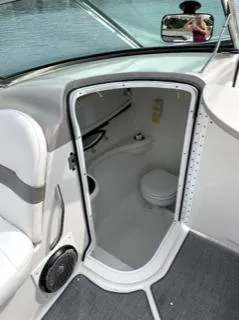Slide: The Image of 2001 Formula 280 Bow Rider boat interior with open restroom door. - 15