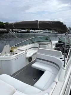 Slide: The Image of 2001 Formula 280 Bow Rider boat with canopy on a calm waterway. - 18