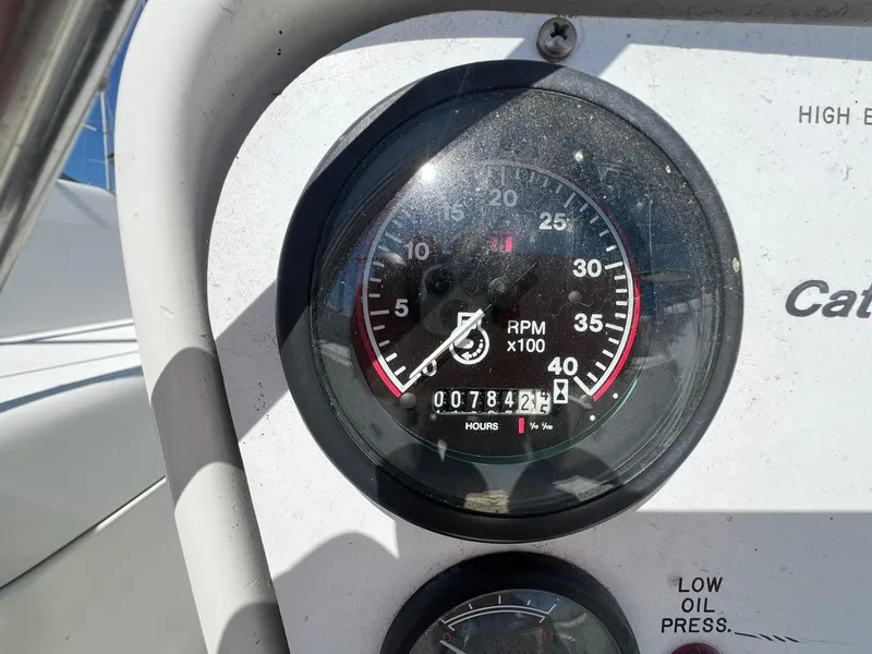 Slide: The Image of Close-up of a 1995 Catalina 320 boat tachometer showing 784.2 engine hours. - 26