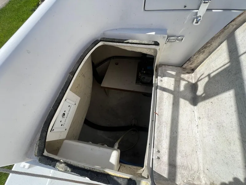 Slide: The Image of Open storage compartment on a 1995 Catalina 320 sailboat. - 28