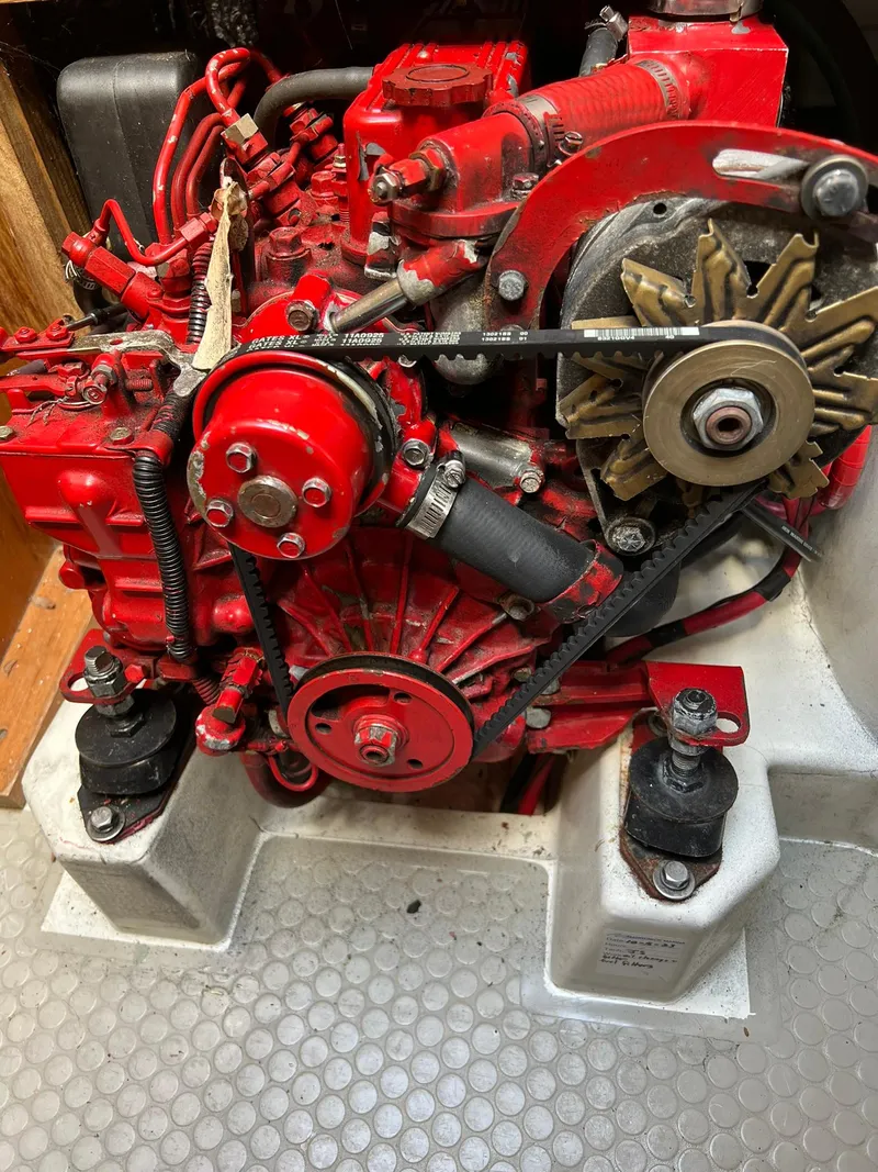 Slide: The Image of Red engine of a 1995 Catalina 320 sailboat. - 44
