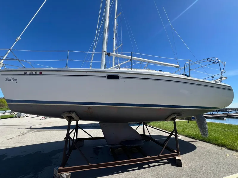 Slide: The Image of 1995 Catalina 320 sailboat on a stand, ready for maintenance. - 5