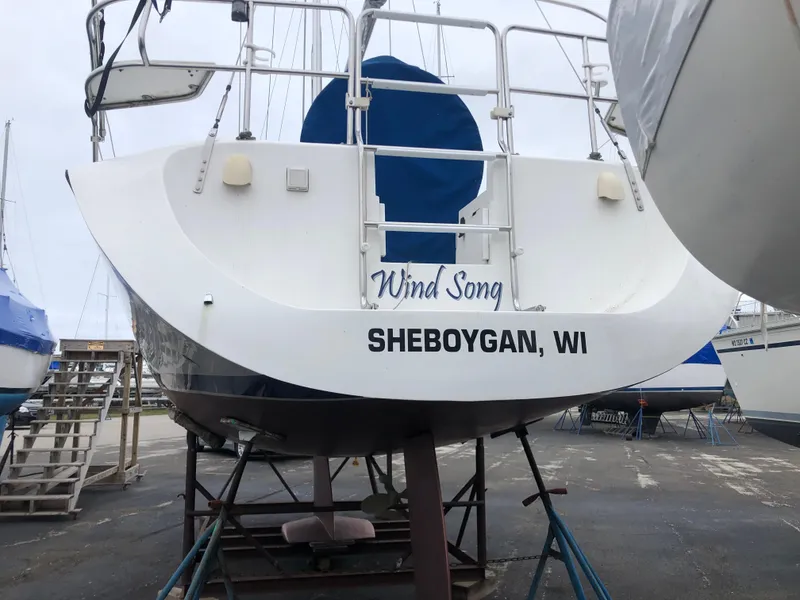 Slide: The Image of Catalina 320 sailboat, 1995 model, named Wind Song in Sheboygan, WI, on dry dock. - 8