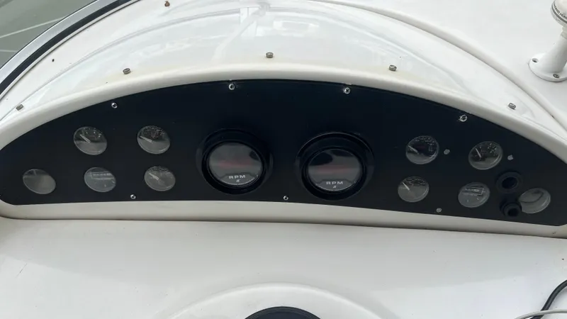 Slide: The Image of Instrument panel of a 1999 Bayliner 3988 Motoryacht with RPM gauges and dials. - 38