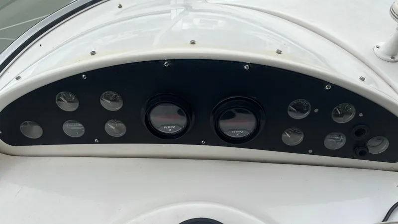 Slide: The Image of Dashboard of 1999 Bayliner 3988 Motoryacht with RPM gauges and instrument panel. - 40