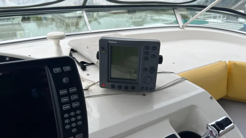 Slide: The Image of 1999 Bayliner 3988 Motoryacht dashboard with navigation equipment and controls. - 41