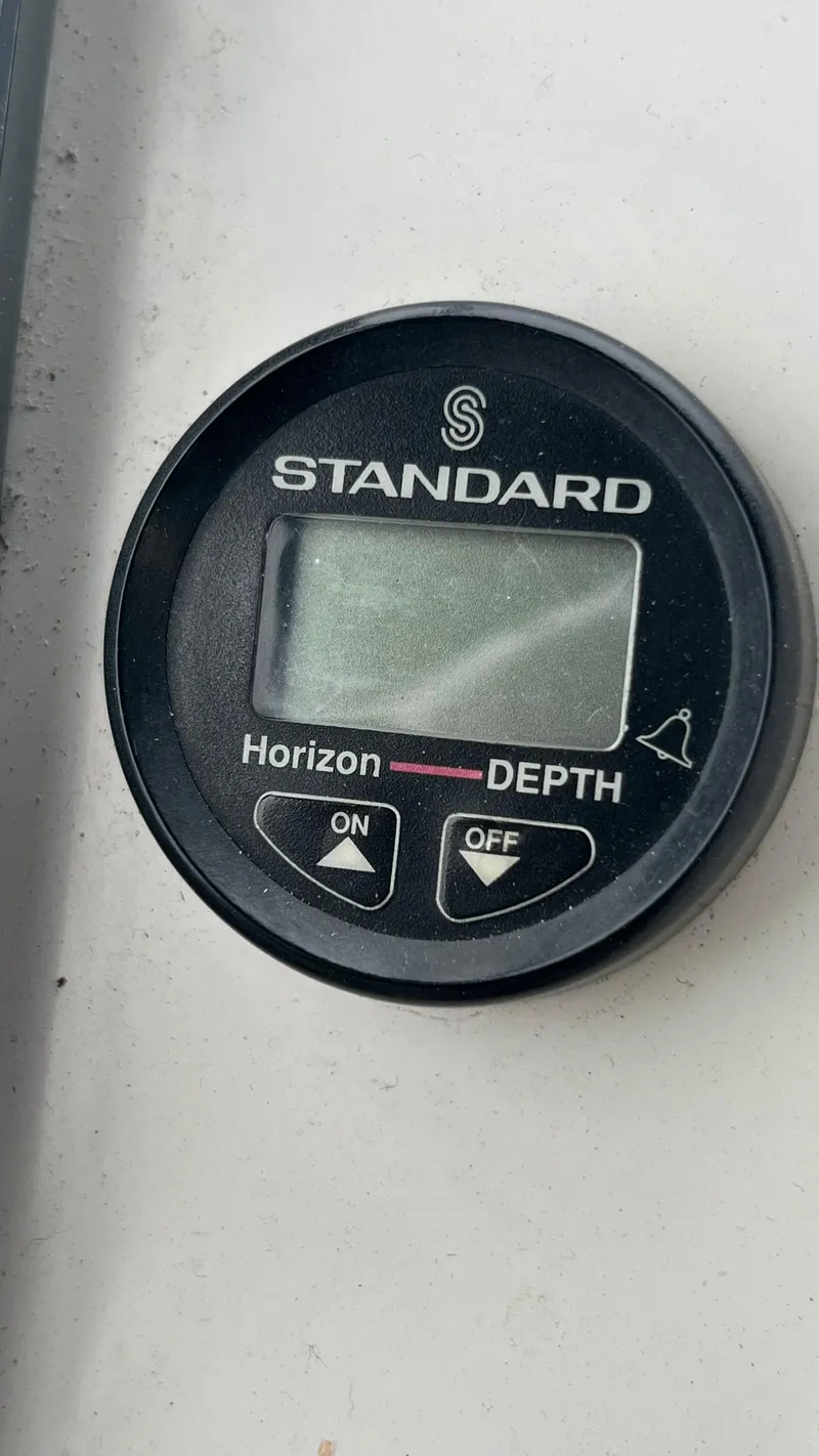 Slide: The Image of Depth gauge on 1999 Bayliner 3988 Motoryacht dashboard. - 46