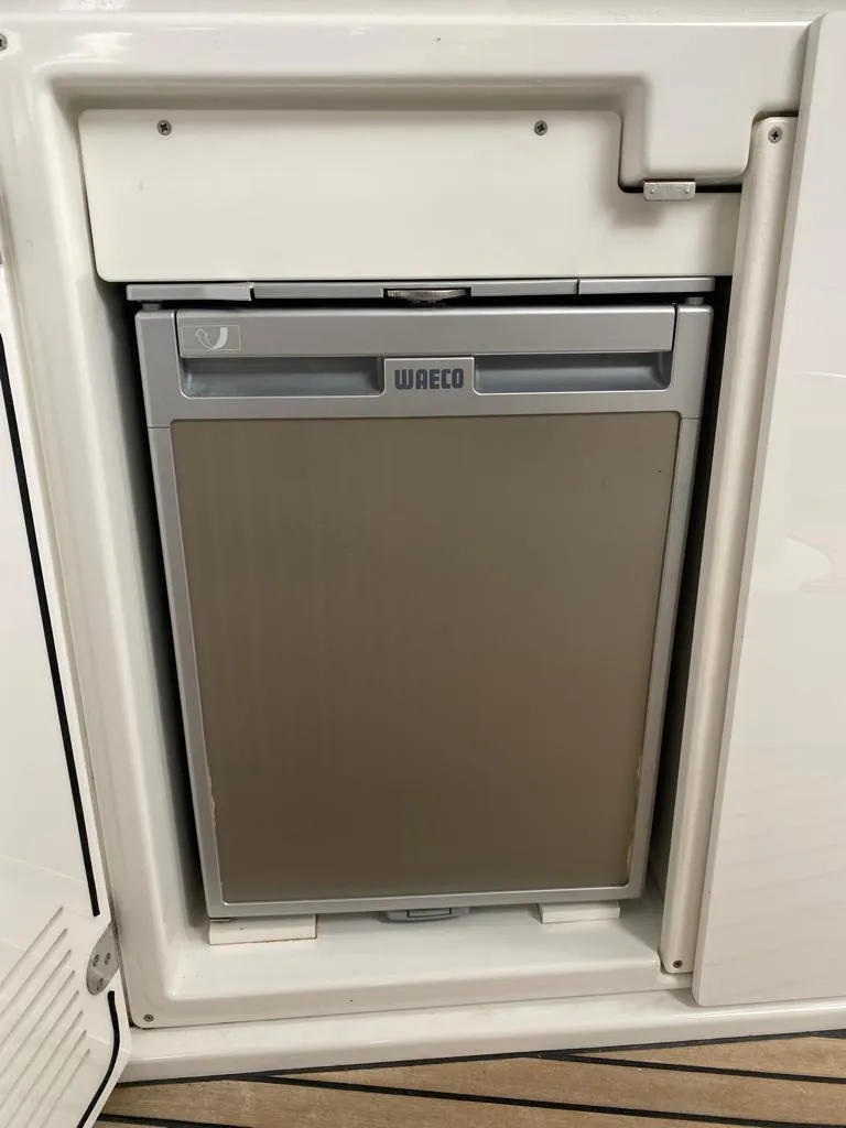 Slide: The Image of Built-in Waeco refrigerator on a 2014 Beneteau 38 yacht. - 21