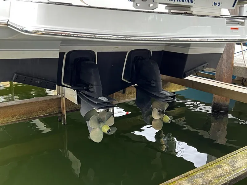 Slide: The Image of Beneteau 38 2014 model boat propellers in water at dock. - 8