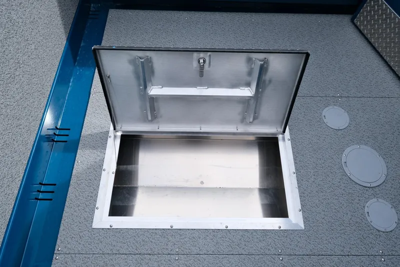 Slide: The Image of Open storage compartment on 2024 Hewescraft 220 Ocean Pro boat deck. - 16