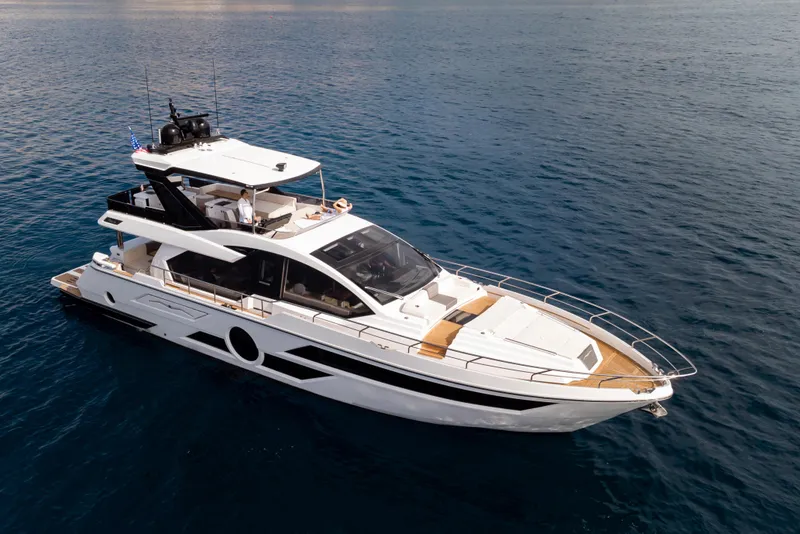 Slide: The Image of Luxury Aicon Vivere 68 yacht cruising on open sea, 2025 model. - 2
