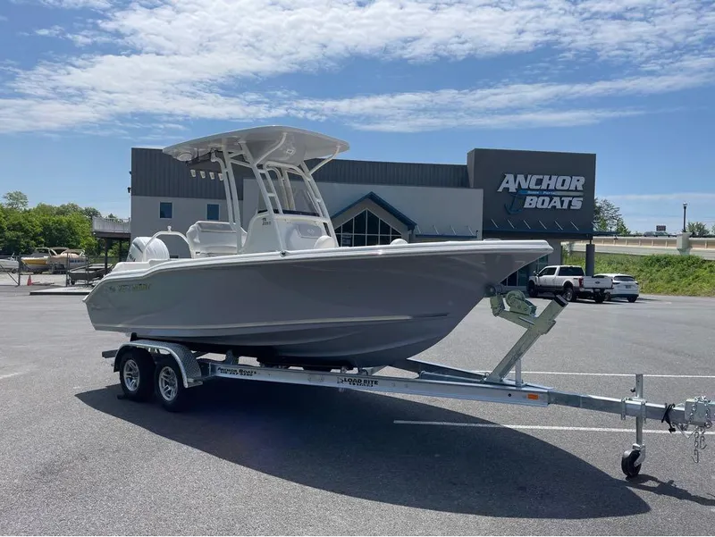 Slide: The Image of 2024 Key West 219 FS boat on trailer at Anchor Boats dealership. - 5